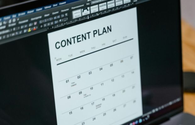 Close-up of an email marketing content plan with scheduling details